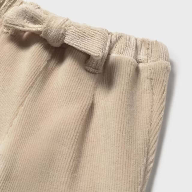Pantalone MAYORAL in velluto a costine beige 1 mese - 18 mesi, dettaglio elastico in vita e fiocco decorativo.