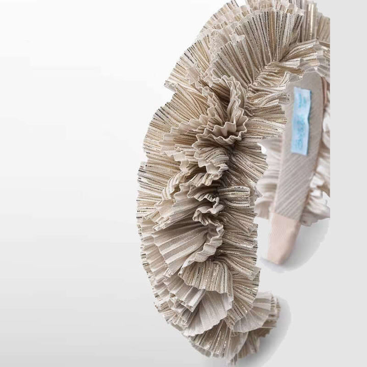 Diadema plisada dorada ABEL & LULA