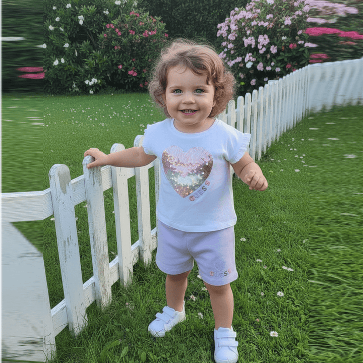 Completo GUESS neonata t-shirt cuore paillettes e shorts rosa  0 mesi - 24 mesi