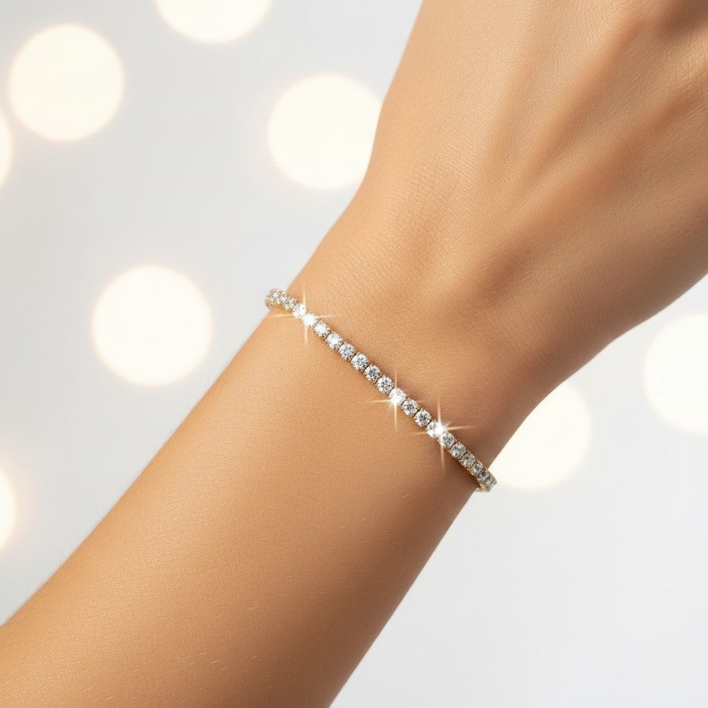 Pulseira tênis dourada com pedras transparentes em aço inoxidável. Pode ser combinado com o colar