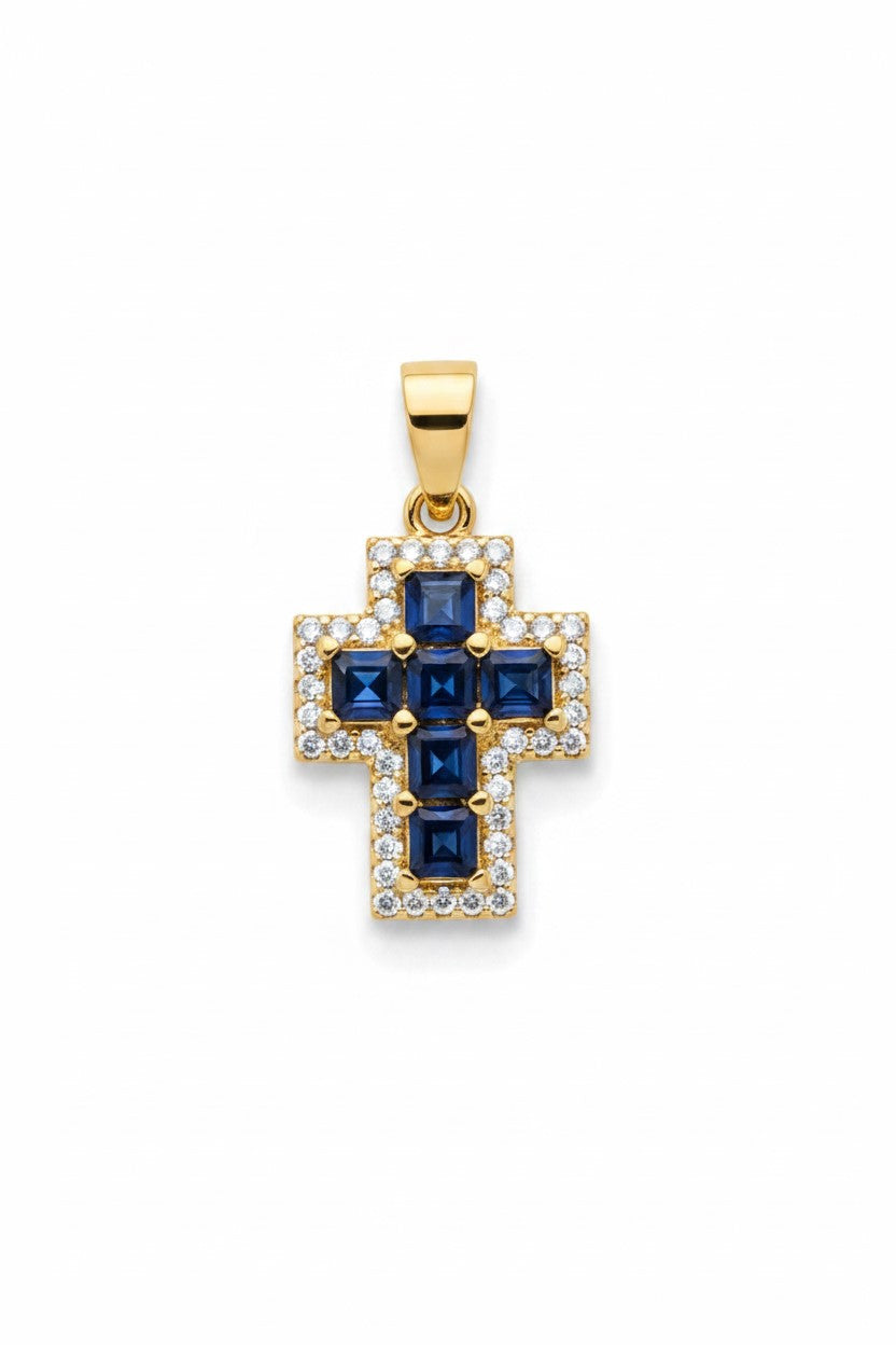 Colgante cruz de oro con circonitas azules y transparentes