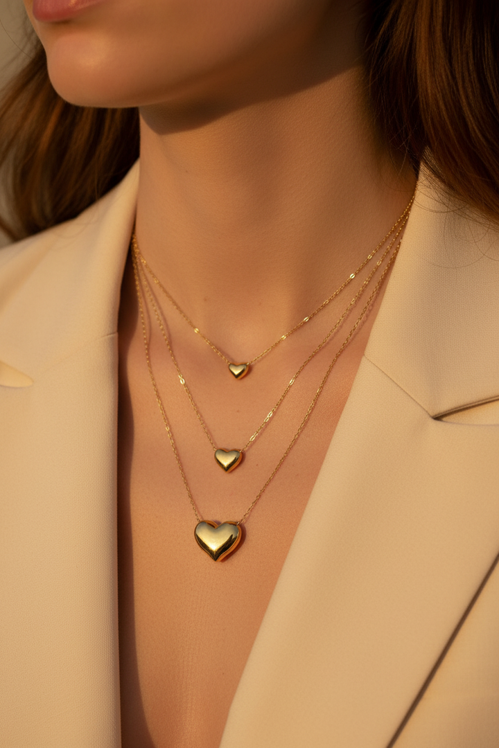 Collana layered cuori oro intenso