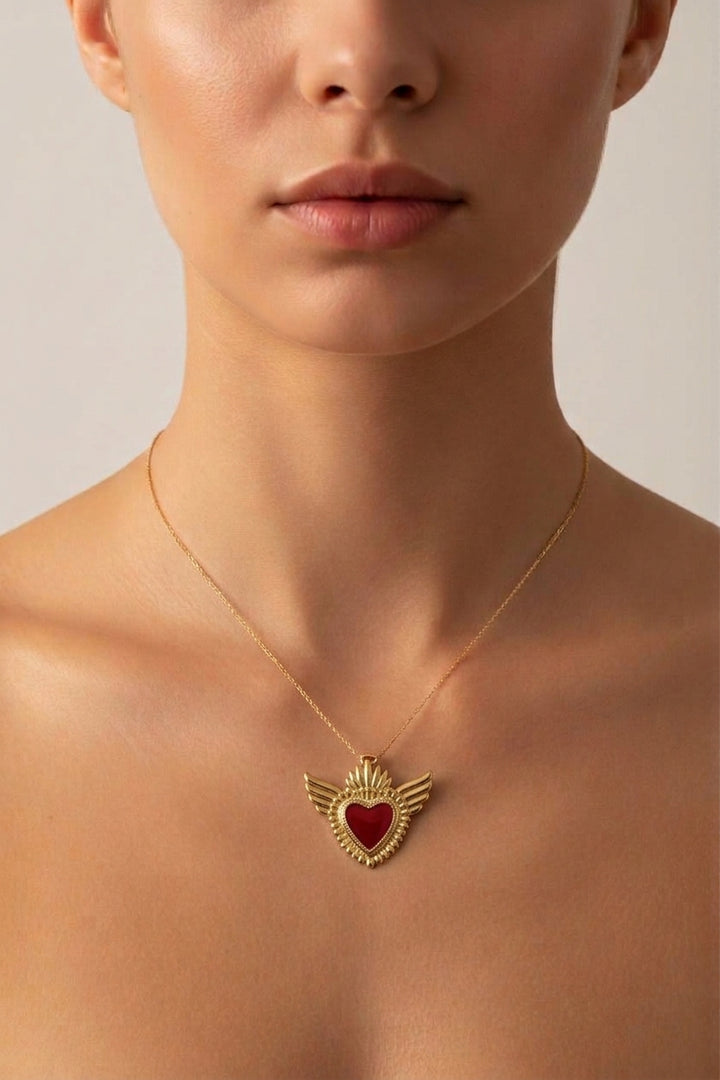 Ciondolo Cuore Alato color oro in acciaio waterproof nichel freee