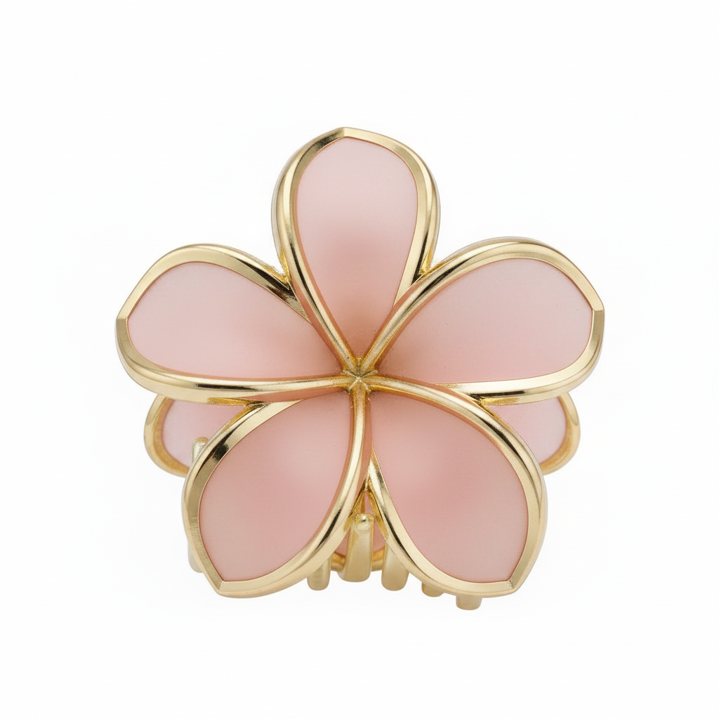 Pink flower-shaped hair clip with gold-colored edges