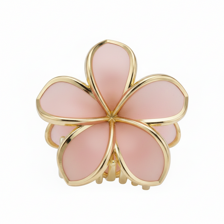 Pink flower-shaped hair clip with gold-colored edges