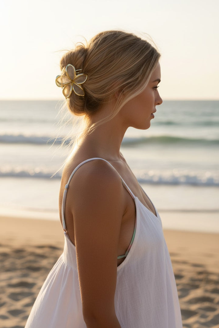 Transparent flower-shaped hair clip with gold-colored edges