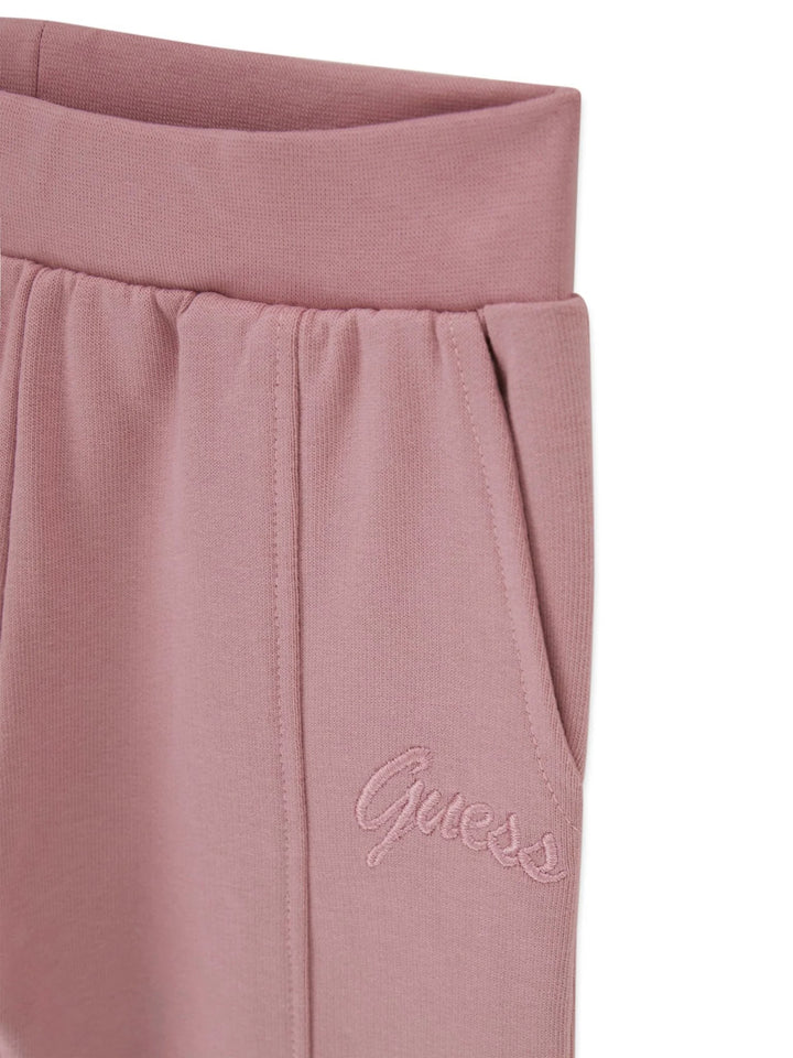 Macacão GUESS com maxi logo e lantejoulas em Nude Pink